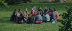 Group of diverse people sitting in a circle