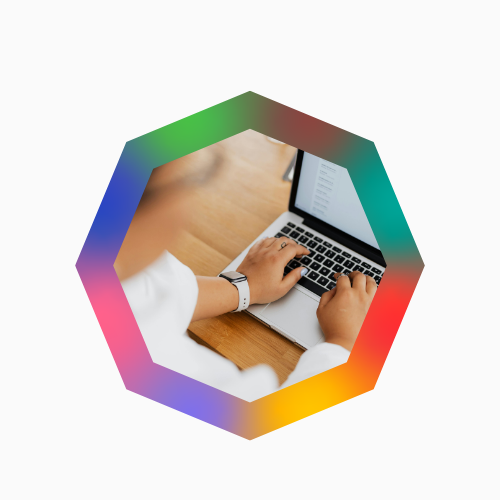 Person typing on laptop, framed within an octagonal border with gradient colors representing the eight pillars.