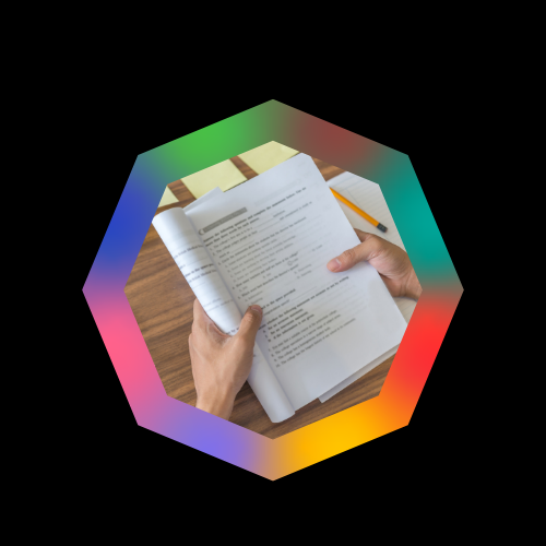 Person reading course materials, framed within an octagonal border with gradient colors representing the eight pillars.