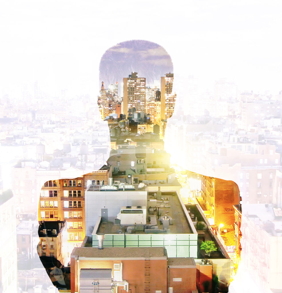 Double-exposure silhouette of a person filled with a glowing city skyline, representing the moment a person becomes the architect of their own life rather than executing within someone else's framework.
